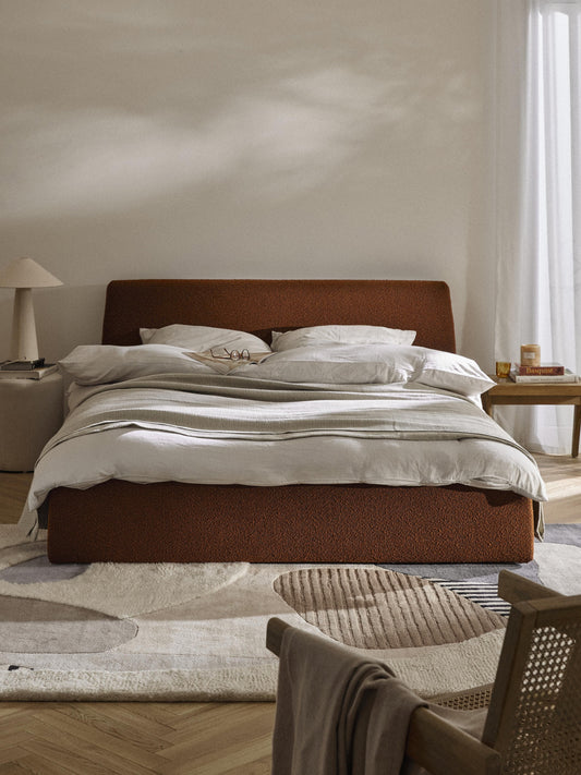 Clovarr Upholstered Storage Bed in Bouclé