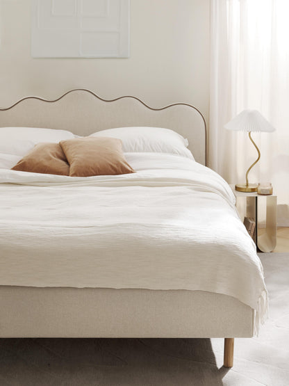 Romsleth Upholstered Bed with Wavy Headboard